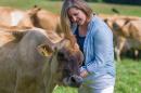 Kristin Duisberg visiting some cows at the UNH organic dairy